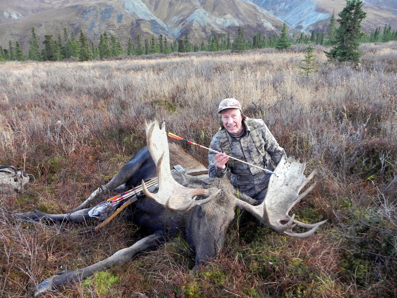 hunter with moose