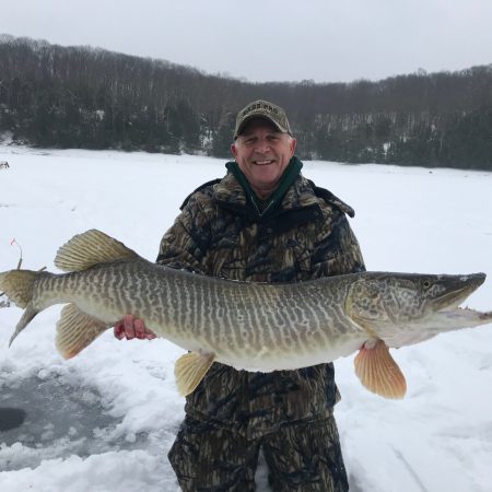 Pennsylvania Ice Fisherman Lucks into a Giant Tiger Muskie on His First Trip to a New Lake