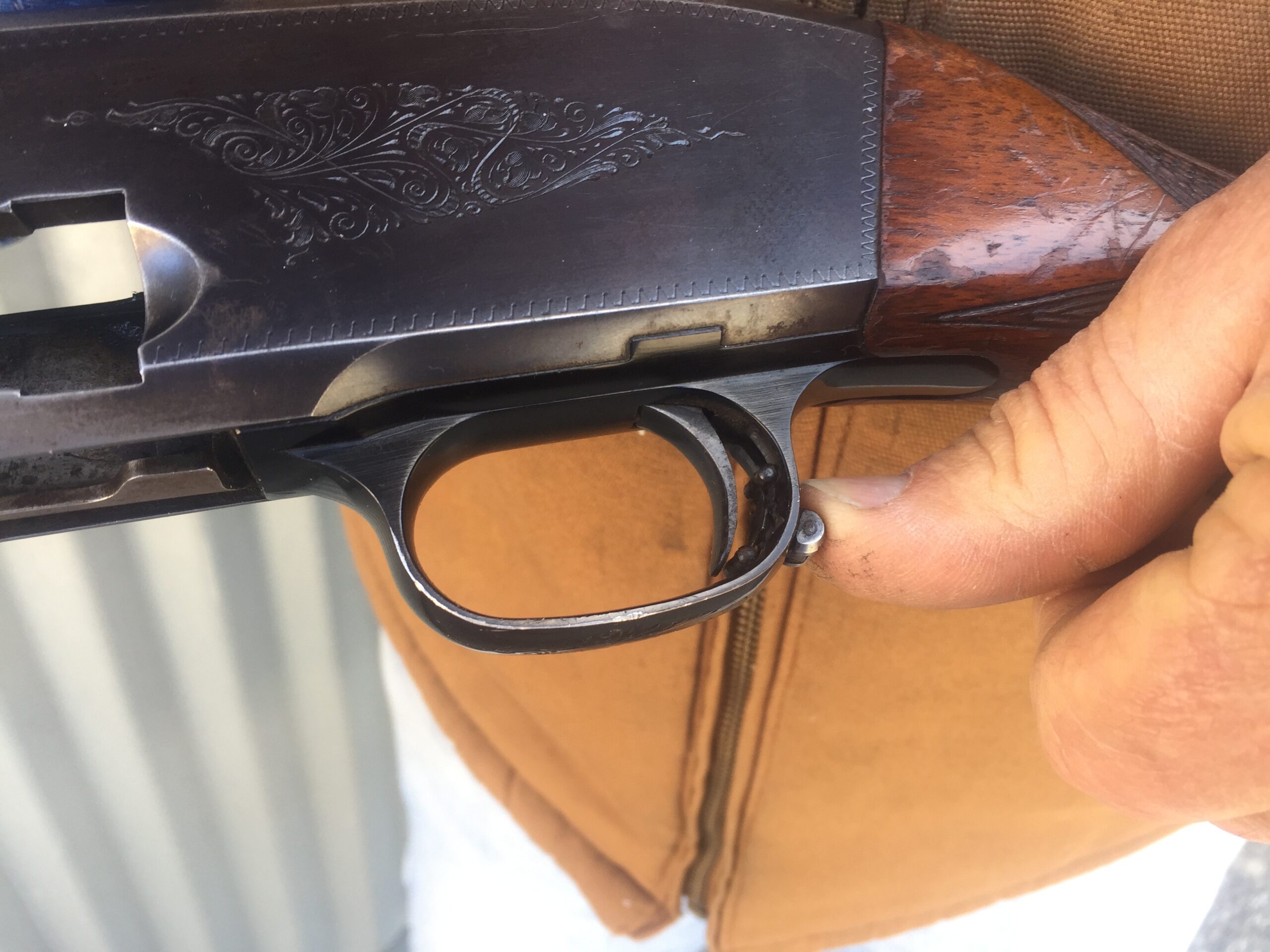 Shooters can find the safety on the rear of the trigger guard.