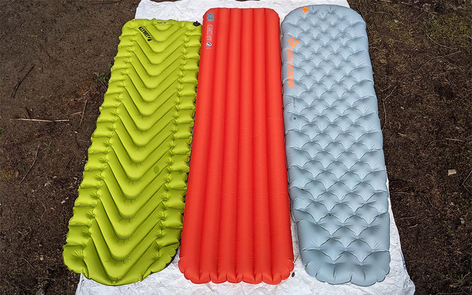 Three side-by-side best backpacking sleeping pads
