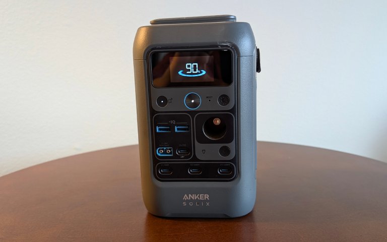 Anker SOLIX C300 sitting on a wooden table against a white wall