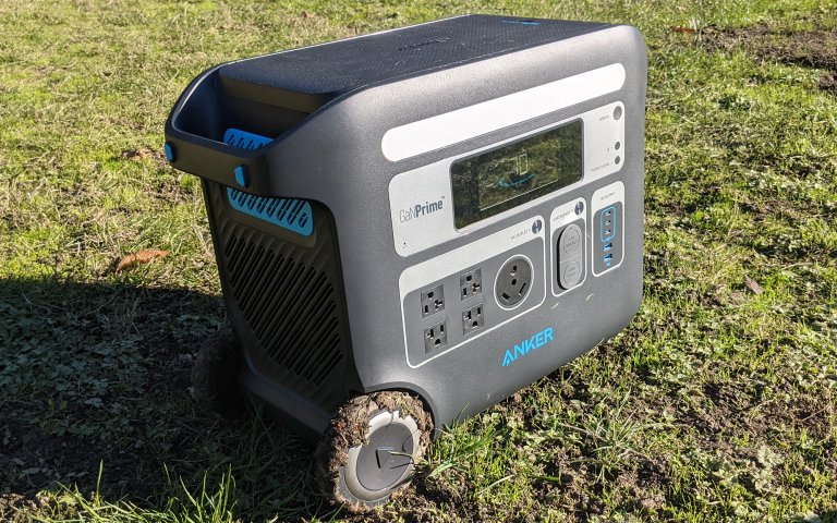 Anker SOLIX F2000 sitting on a grassy field
