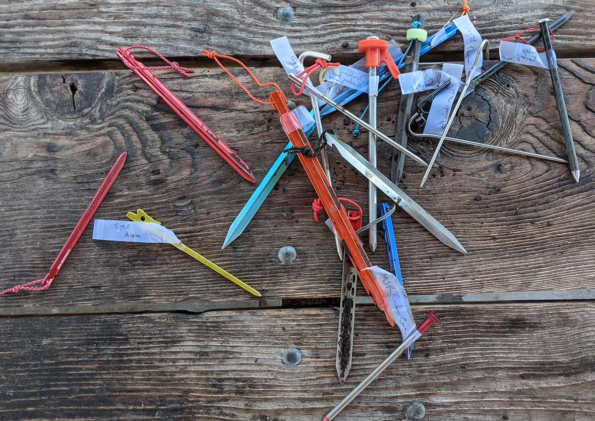 The best tent stakes piled on a table.