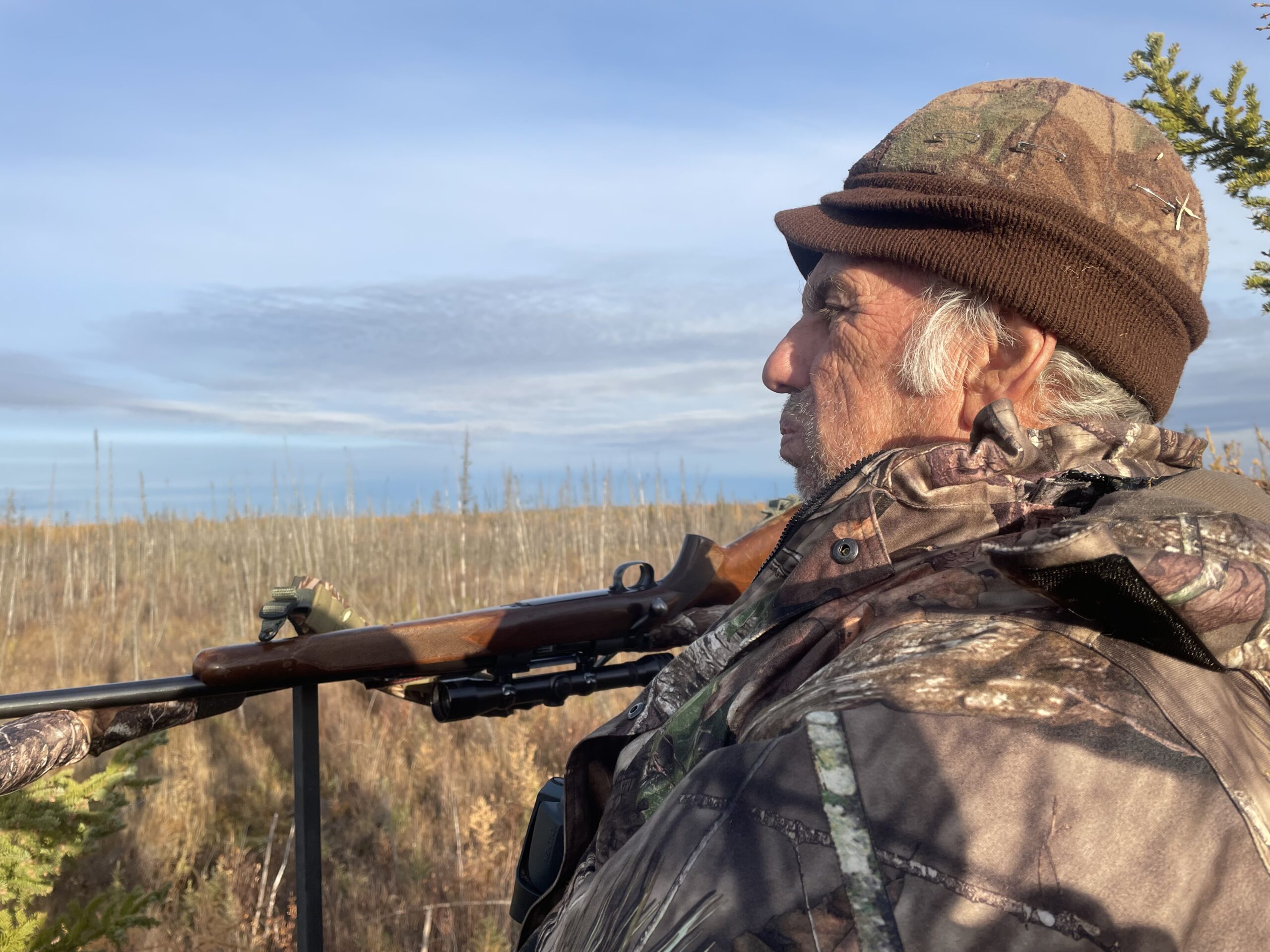 A moose Hunter watches for an approaching bull