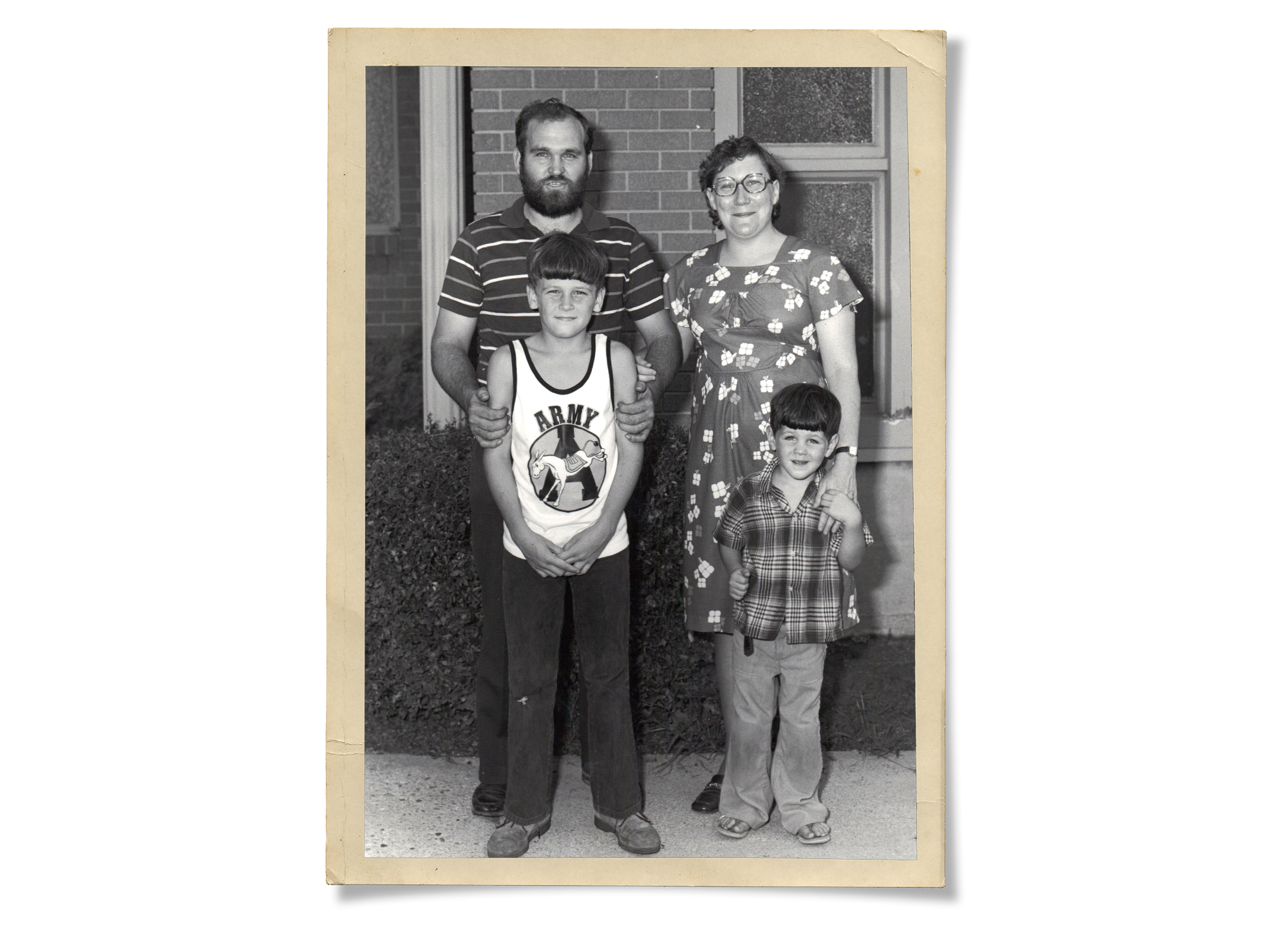family photo of Virgil, Mary, and Wade Tackett