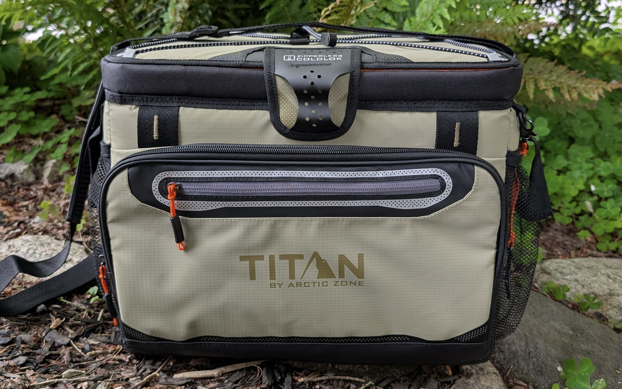 Titan Zipperless Cooler set against foliage