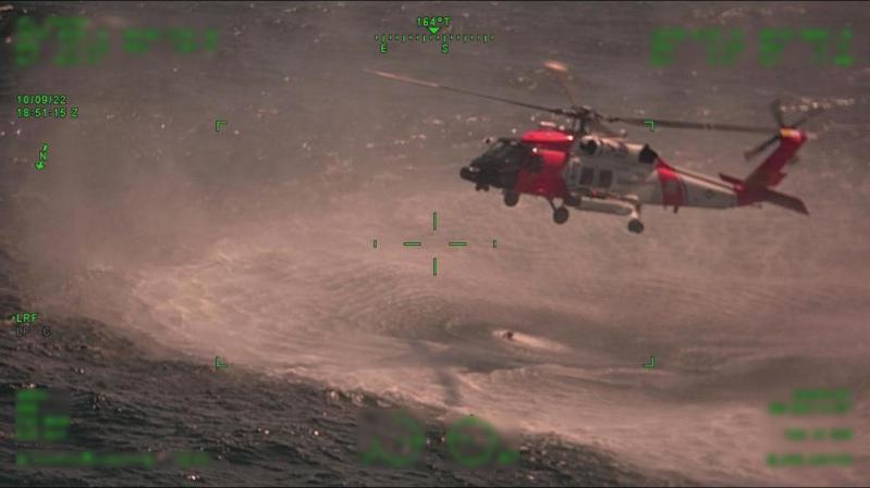 Video: Coast Guard Rescues Boaters Who Were "Fending Off Sharks"