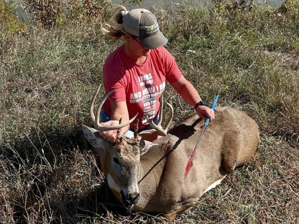 Angie Kokes spears whitetail buck
