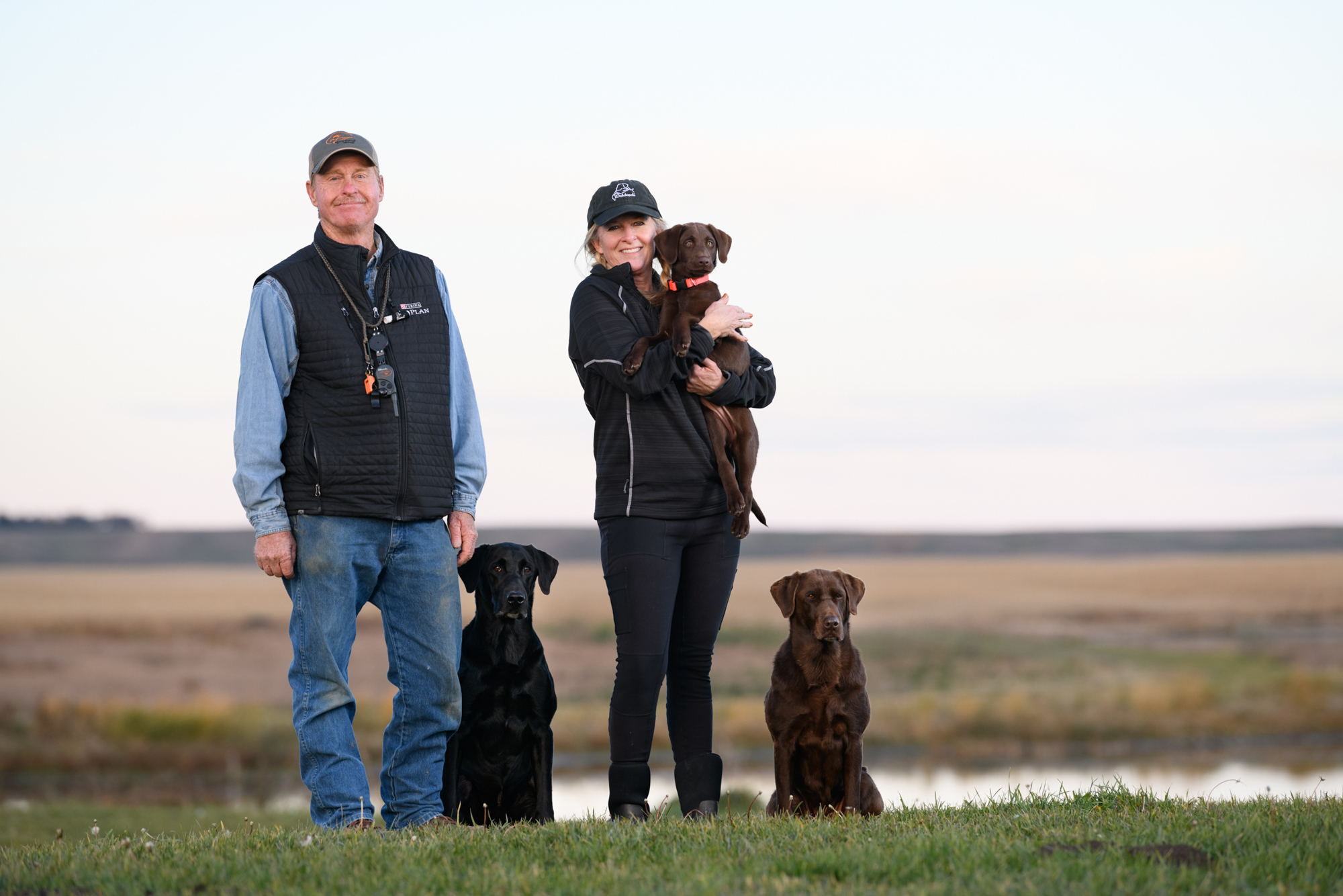Tom and Tina Dokken at home in South Dakota with their dogs.