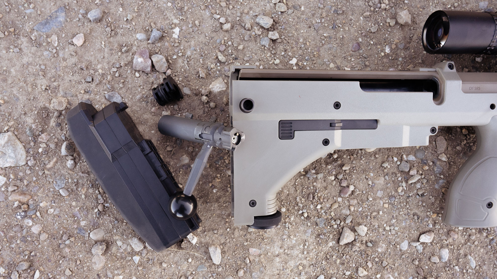 Disassembled stock on the desert tech rifle showing the recoil pad and bolt assembly