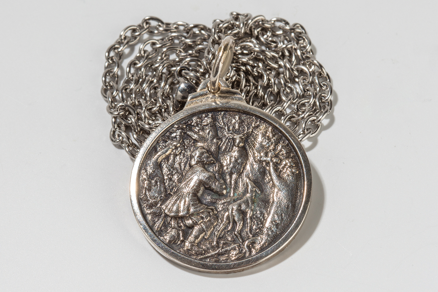 a metal hunter medalion