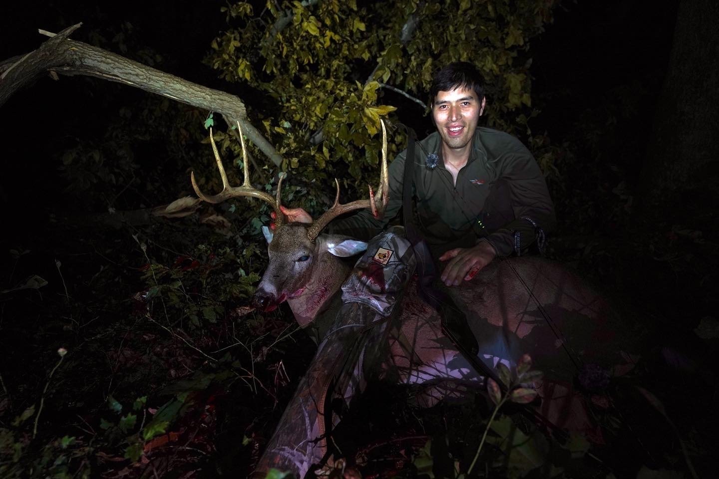 Hunter and whitetail deer