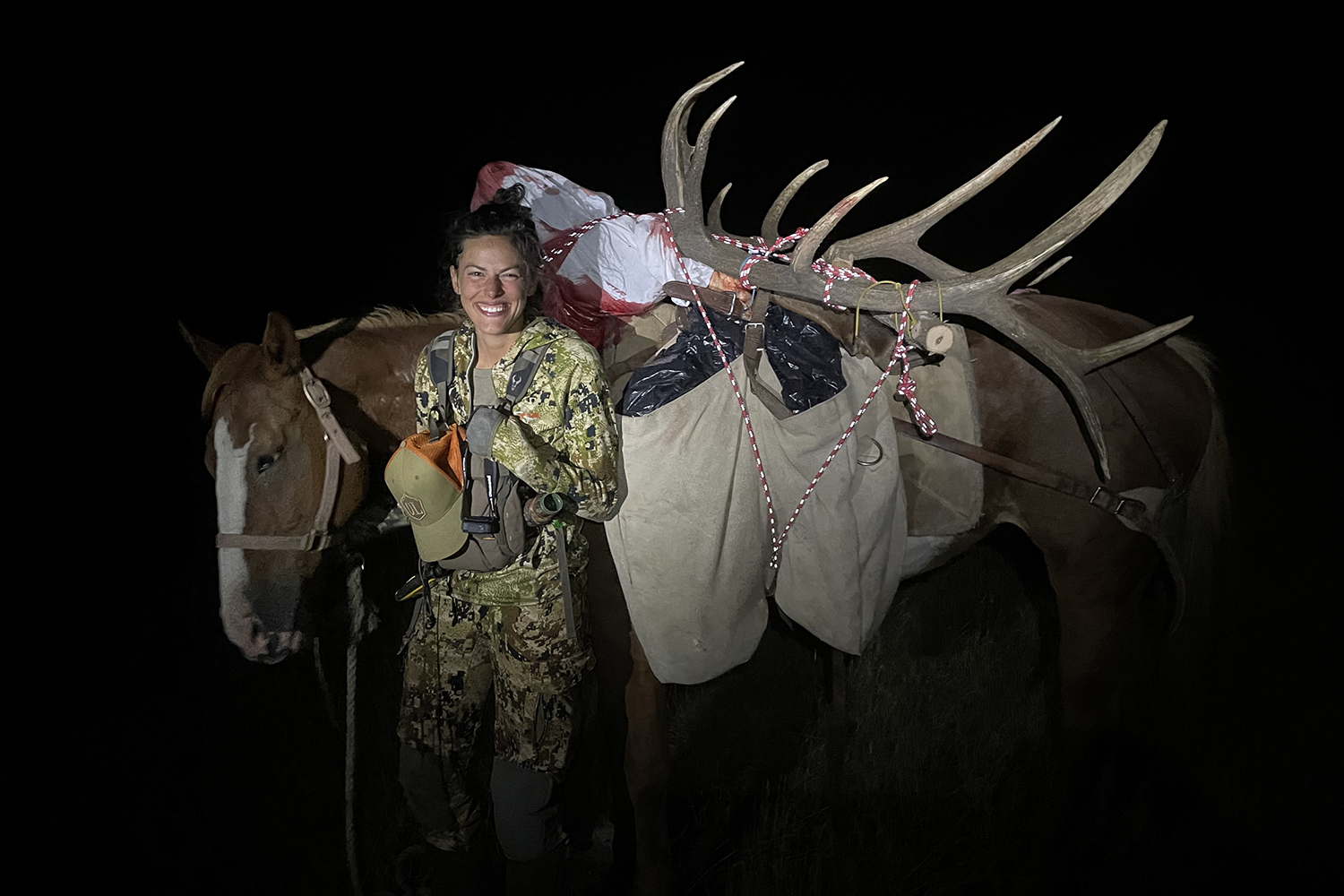 hunter with horse and elk antlers