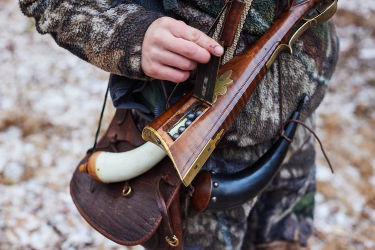 A Pennsylvania flintlock rifle with a compartment in the stock.