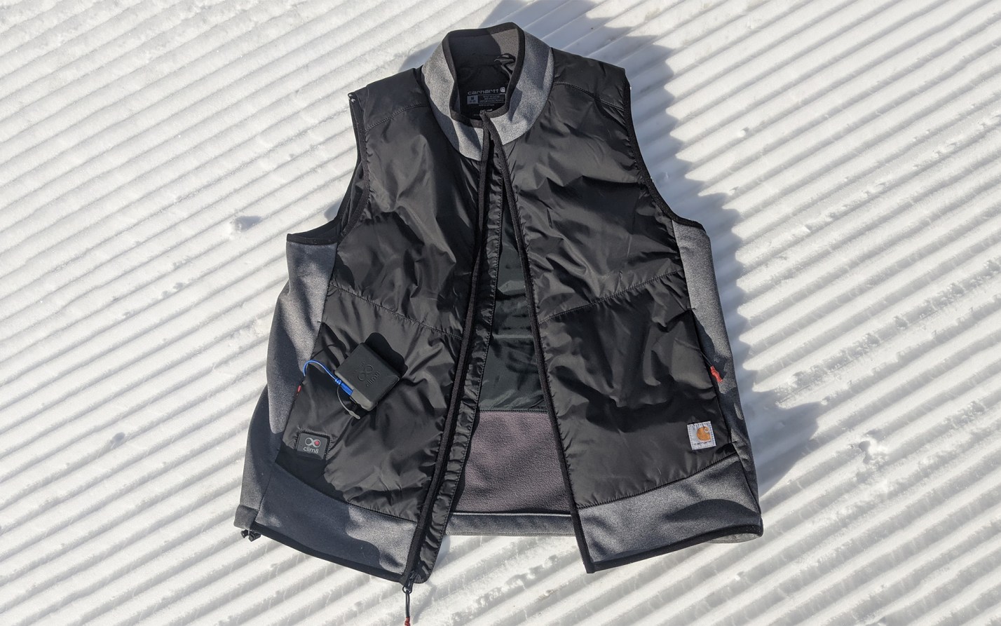 The Carhartt X-1 Smart Heated Vest uses artificial intelligence to keep you warm.
