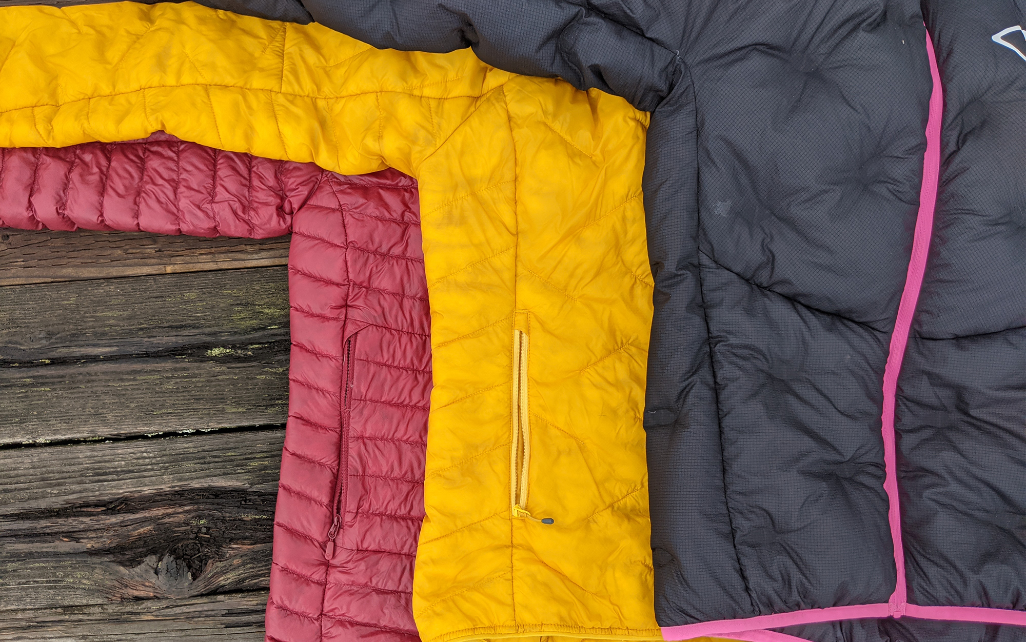 From left to right: the classic horizontal baffling of the Norrona Trollveggen, the minimal baffling of the Outdoor Research Superstrand, and the glued-in baffling of the Crazy Levity. It was also notable how naturally puffed-out the 1000fp of the Crazy Levity was next to the best-in-class synthetics of the Superstrand and the 850fp of the Trollveggen.