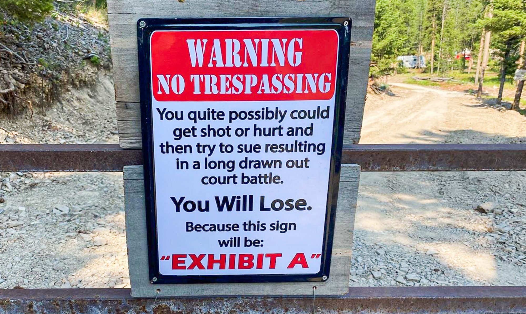 No Trespassing sign on blocked public access
