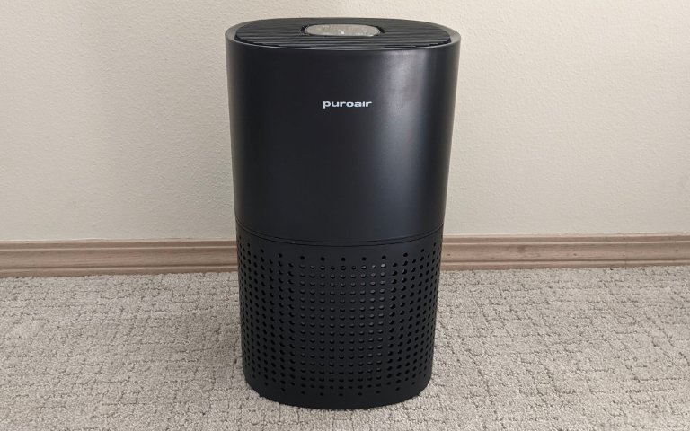 PuroAir air purifier set against a white wall