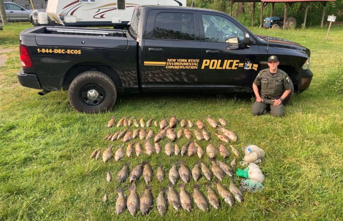 Poachers Caught with 71 Fish Stuffed in Their Backpacks, Including Trophy Bass