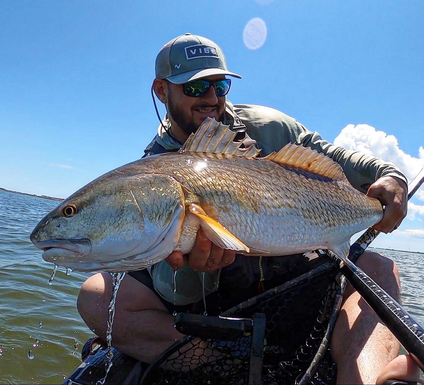 A red caught on a saltwater baitcasting reel