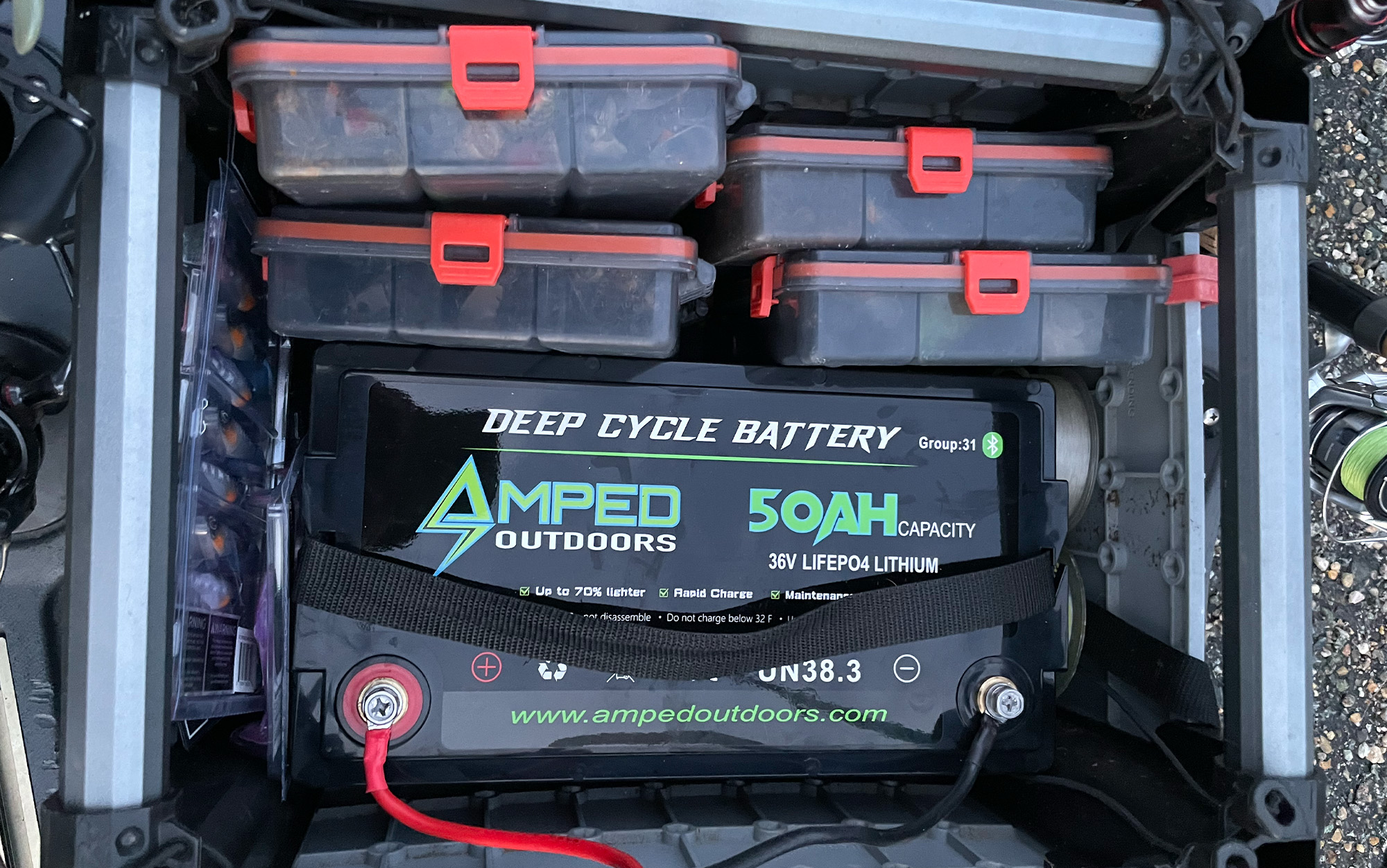 The Amped Outdoors battery easily fits inside a Hobie H crate.