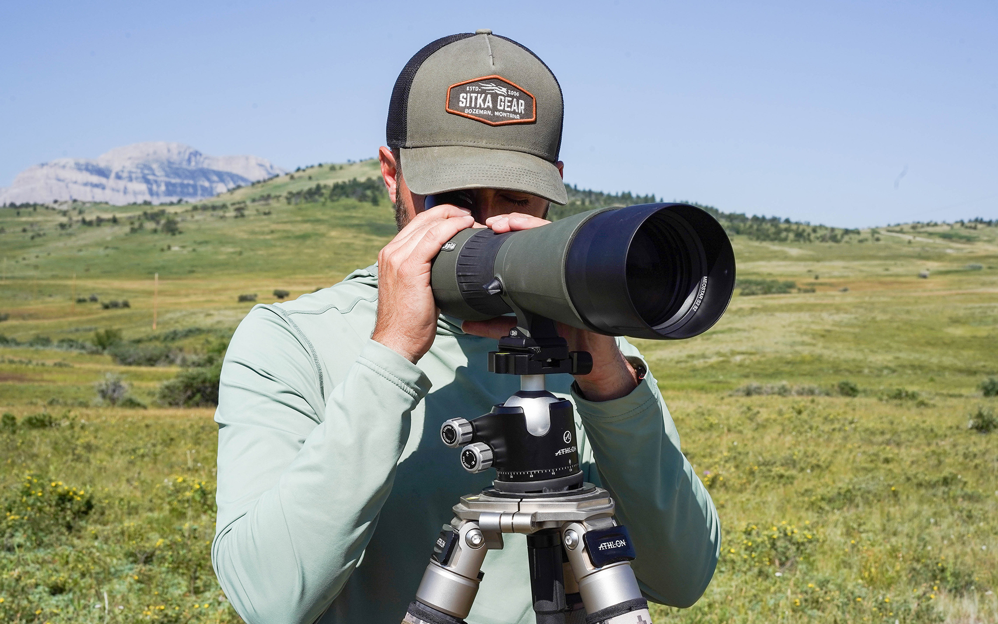 Tester looks through the overall best spotting scope.