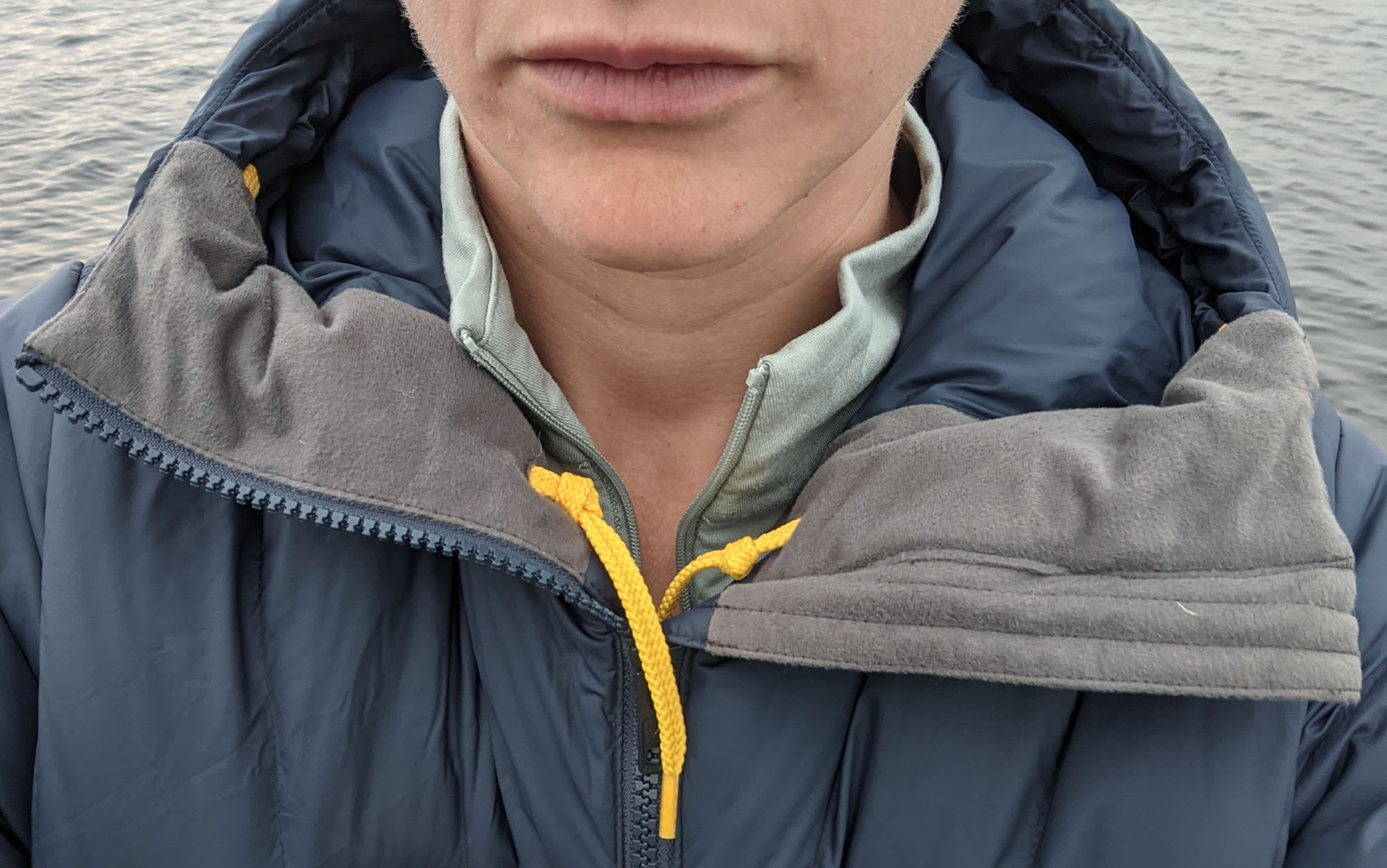 A flannel panel inside the Fjallraven Expedition Pack Down Hoodie adds comfort and functionality to the coldest days.