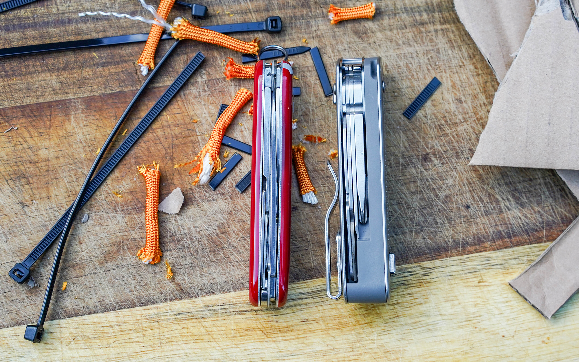 The Compact SAK and Leatherman Free T4 next to each other for size comparison.