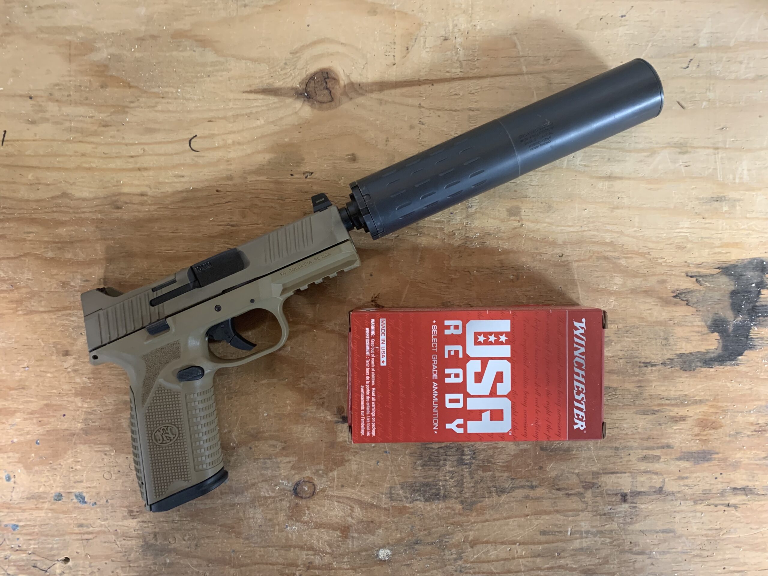 suppressed FN pistol