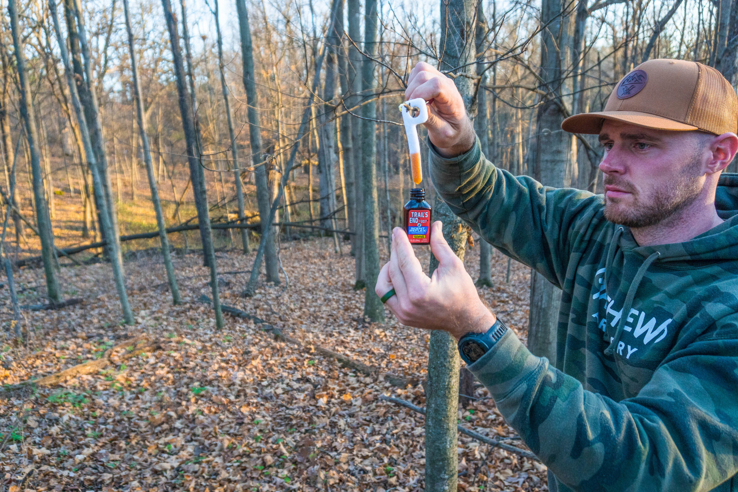 The author creates a mock scrape using a deer attractant