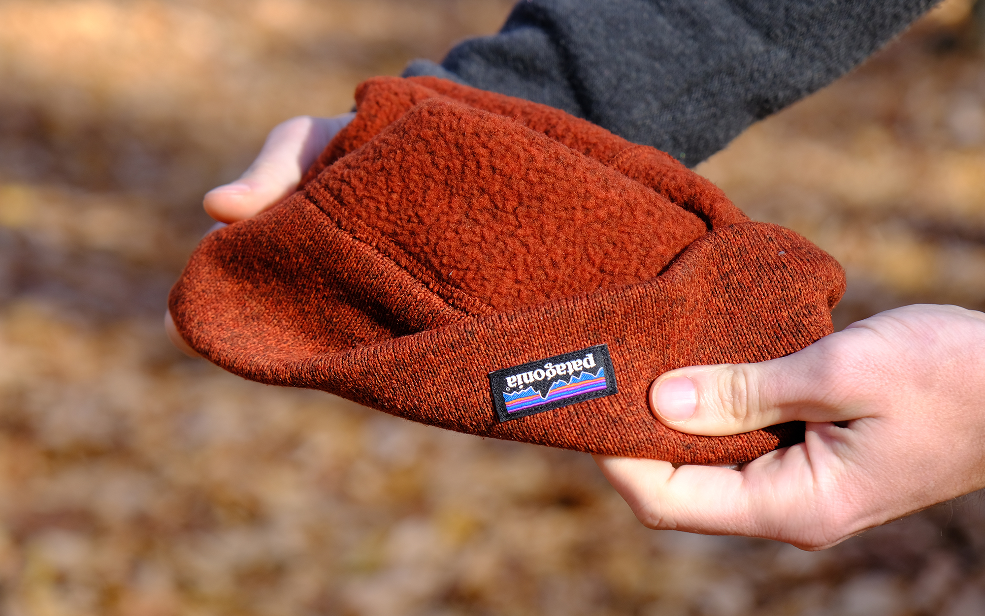 Author holds Patagonia winter hat inside out.