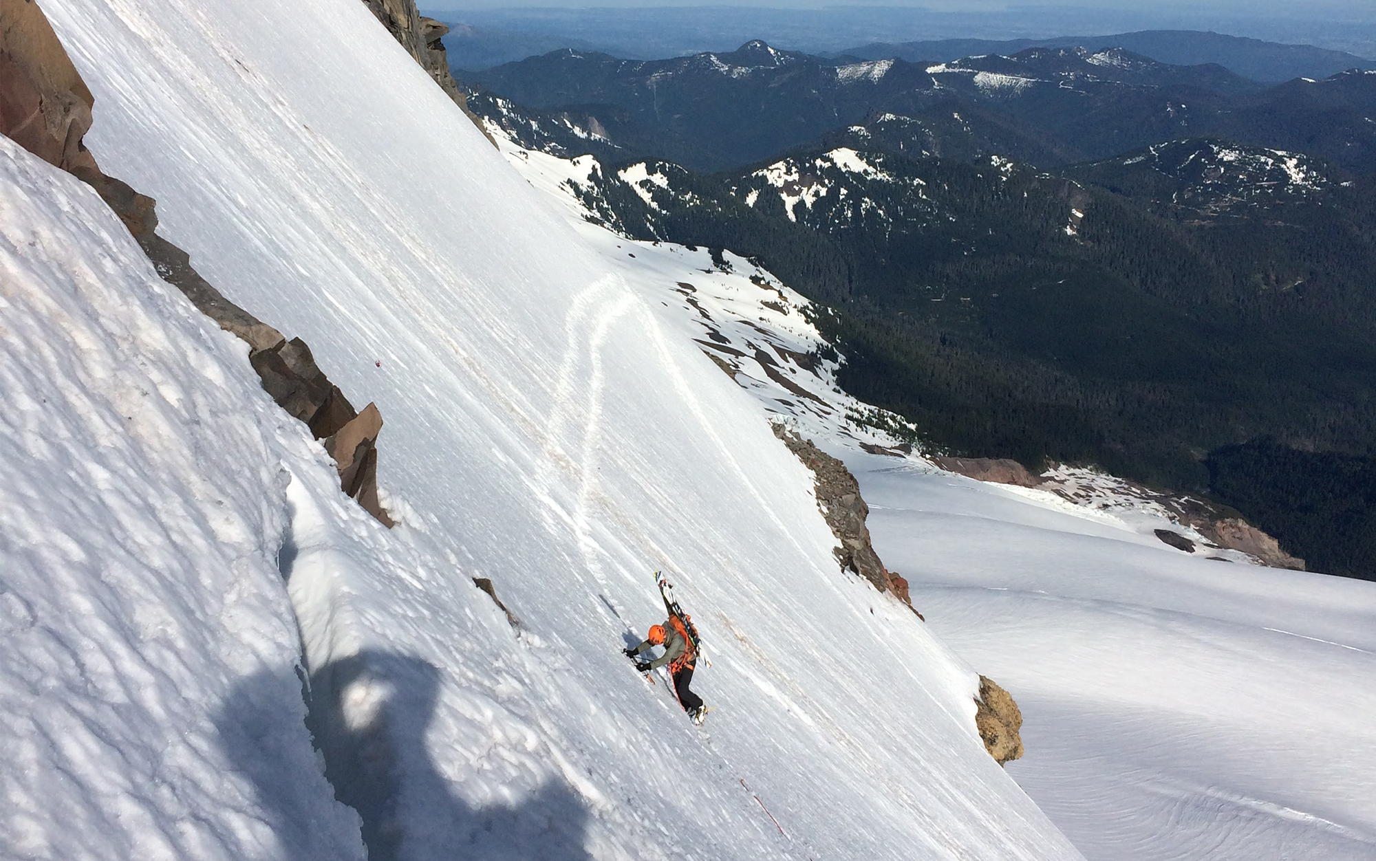 Skier uses the Black Diamond Nerve Pro to cross a steep and snowy section.