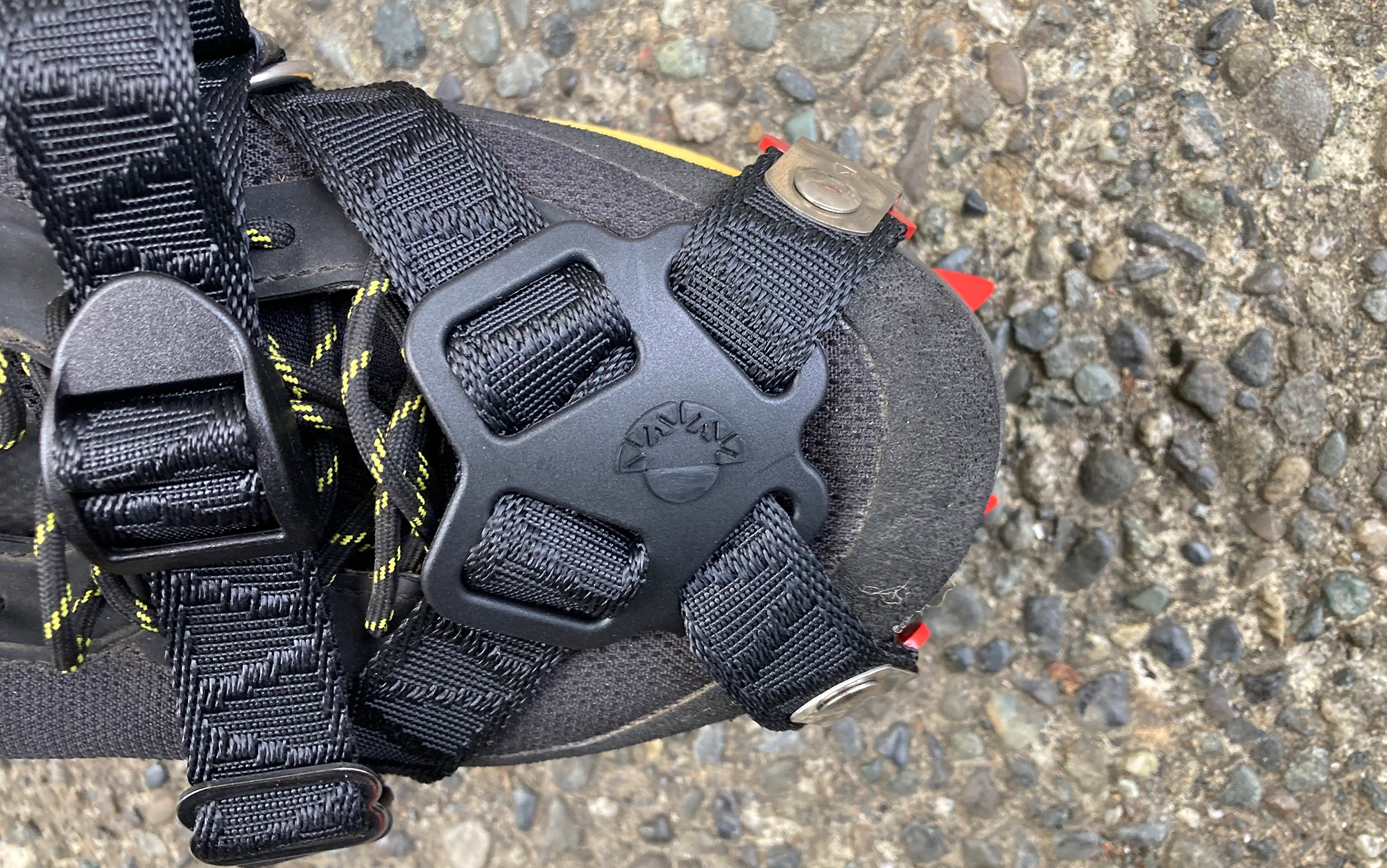 The straps of the Kahtoola crampons secure to any hiking shoe.