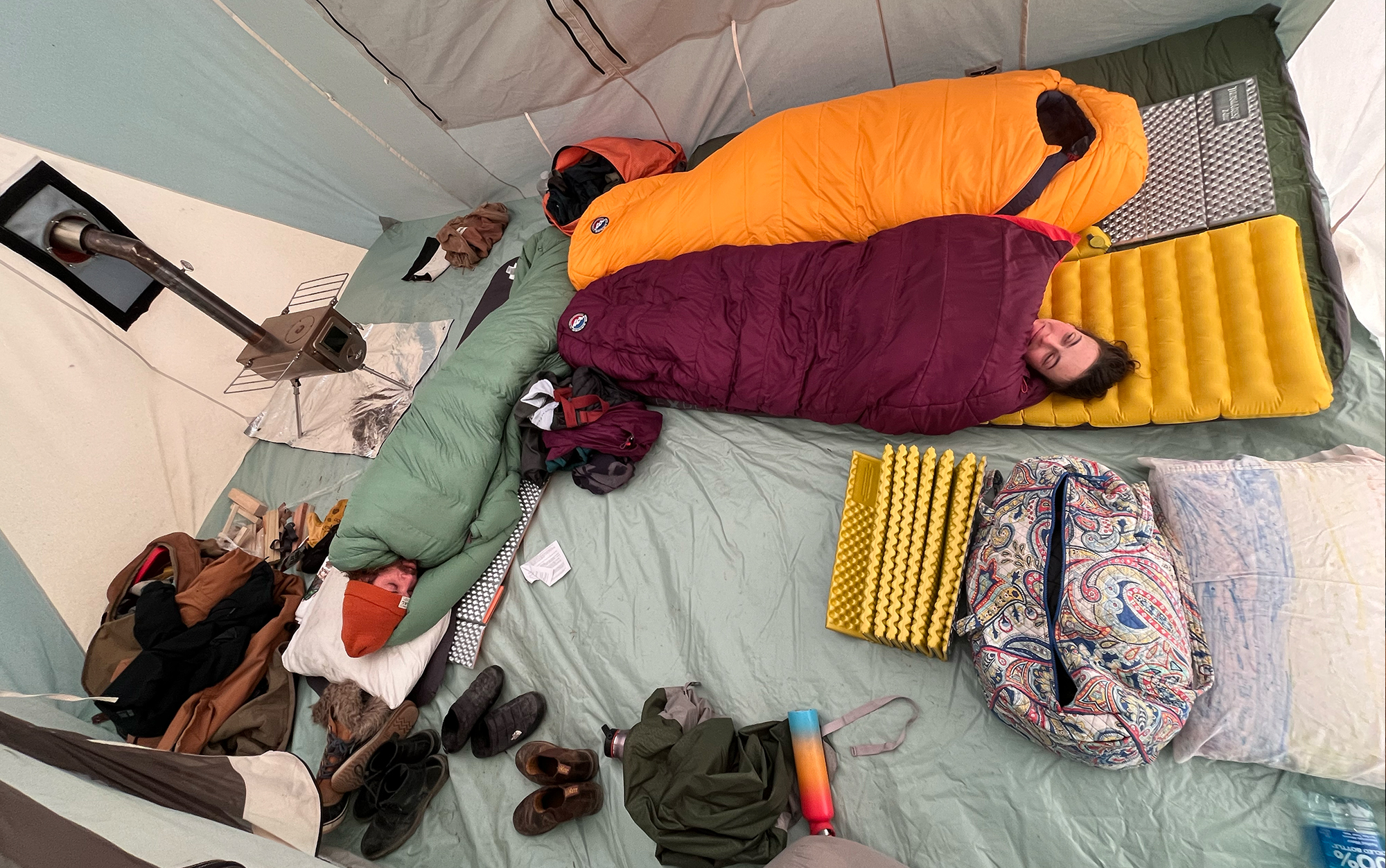 Four adults sprawled out lavishly inside this 140-square-foot tent.