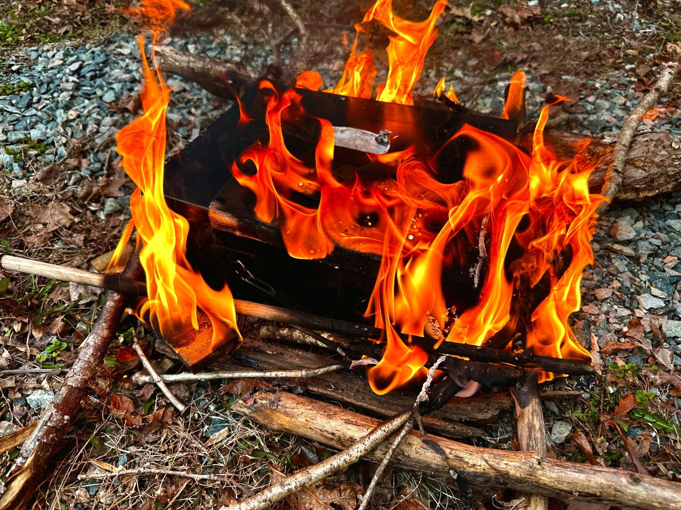 Testing a fireproof safe by setting it on fire.
