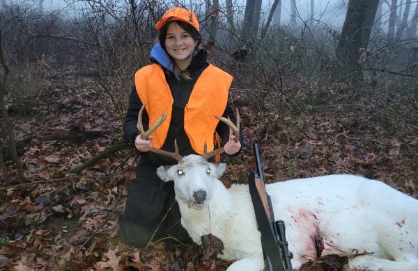 Teen Tags Her First Deer, a Piebald Buck, with Help from Grandpa
