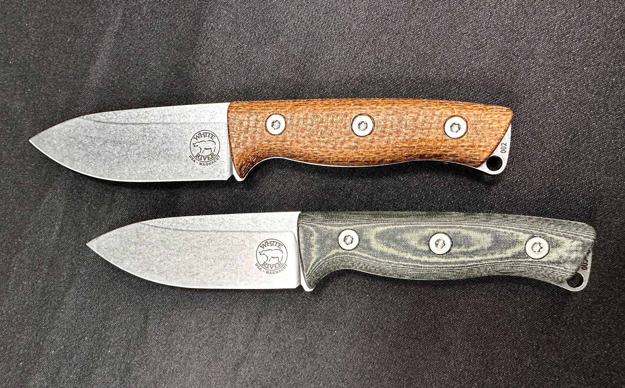 Two short fixed-blade knives side-by-side