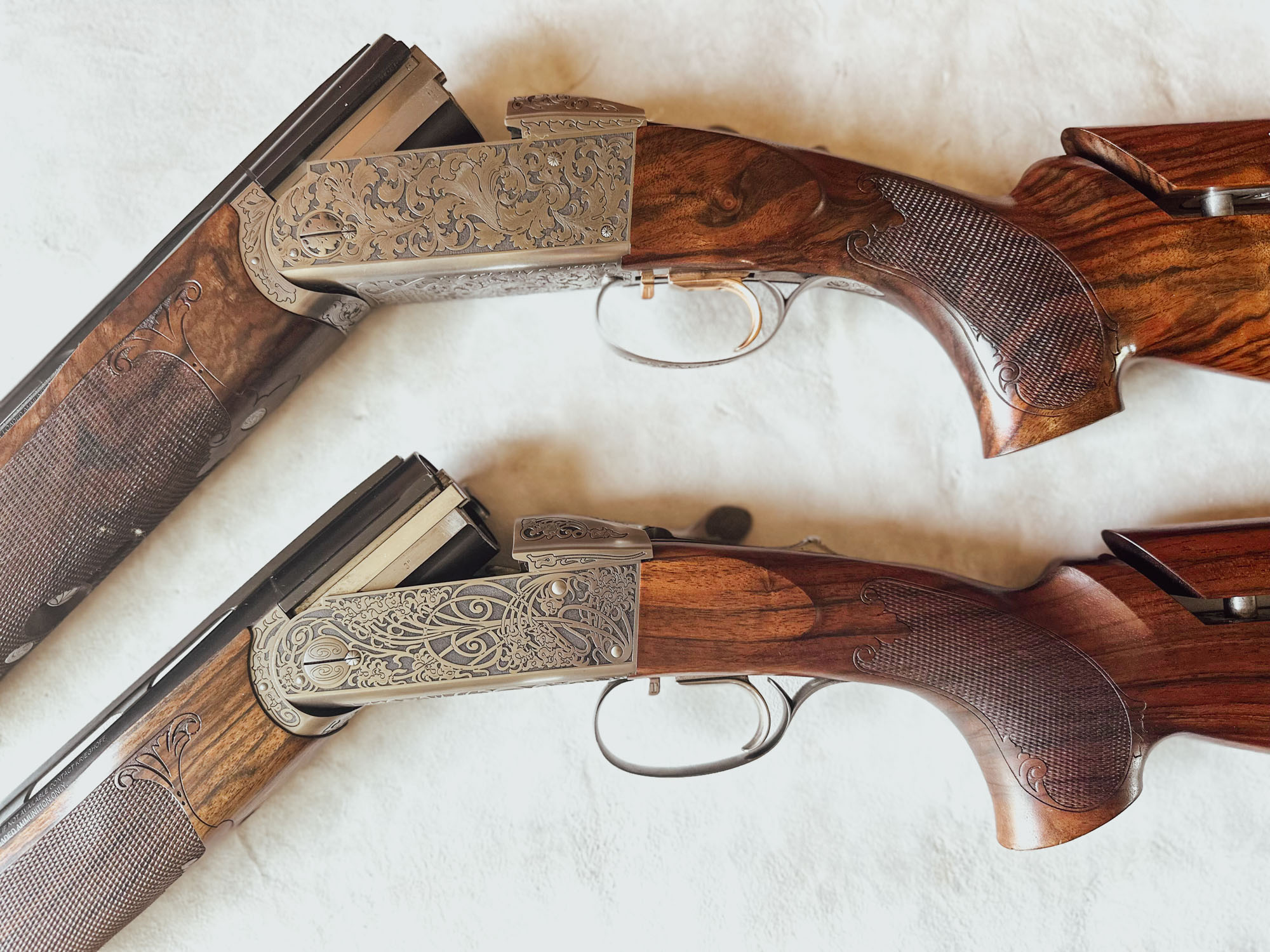 Krieghoff K-20 Victoria and Krieghoff K-80 Victoria stacked on top of each other