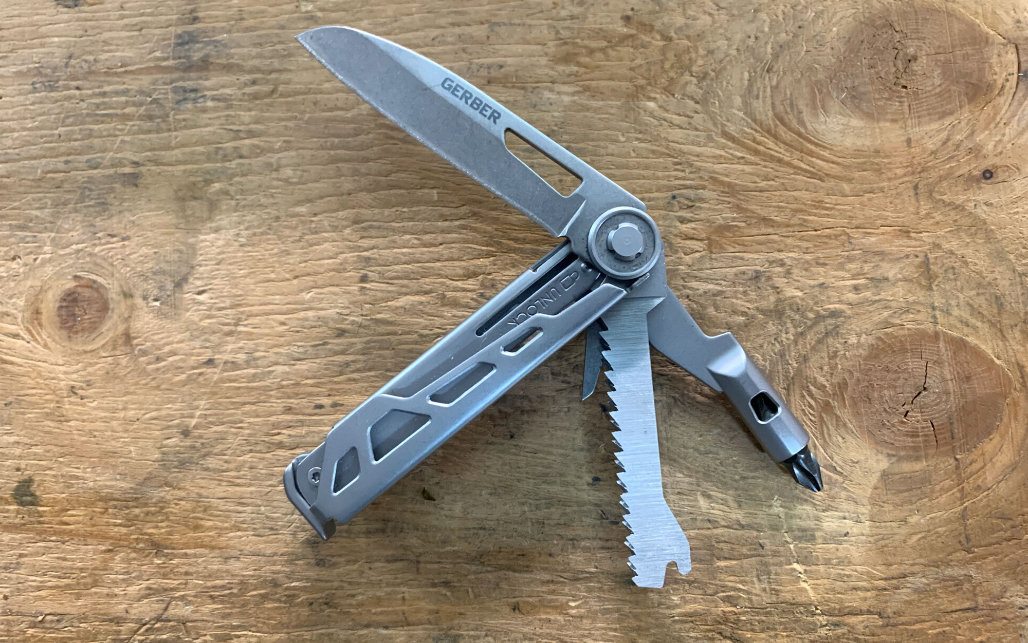 The Gerber Armbar Trade features a drop-point knife blade, ¼-inch driver, double-sided flat/Phillips bit, saw, awl/punch tool, small serrated sawing section, ¼-inch wrench, and bottle opener/pry/hammer tool.