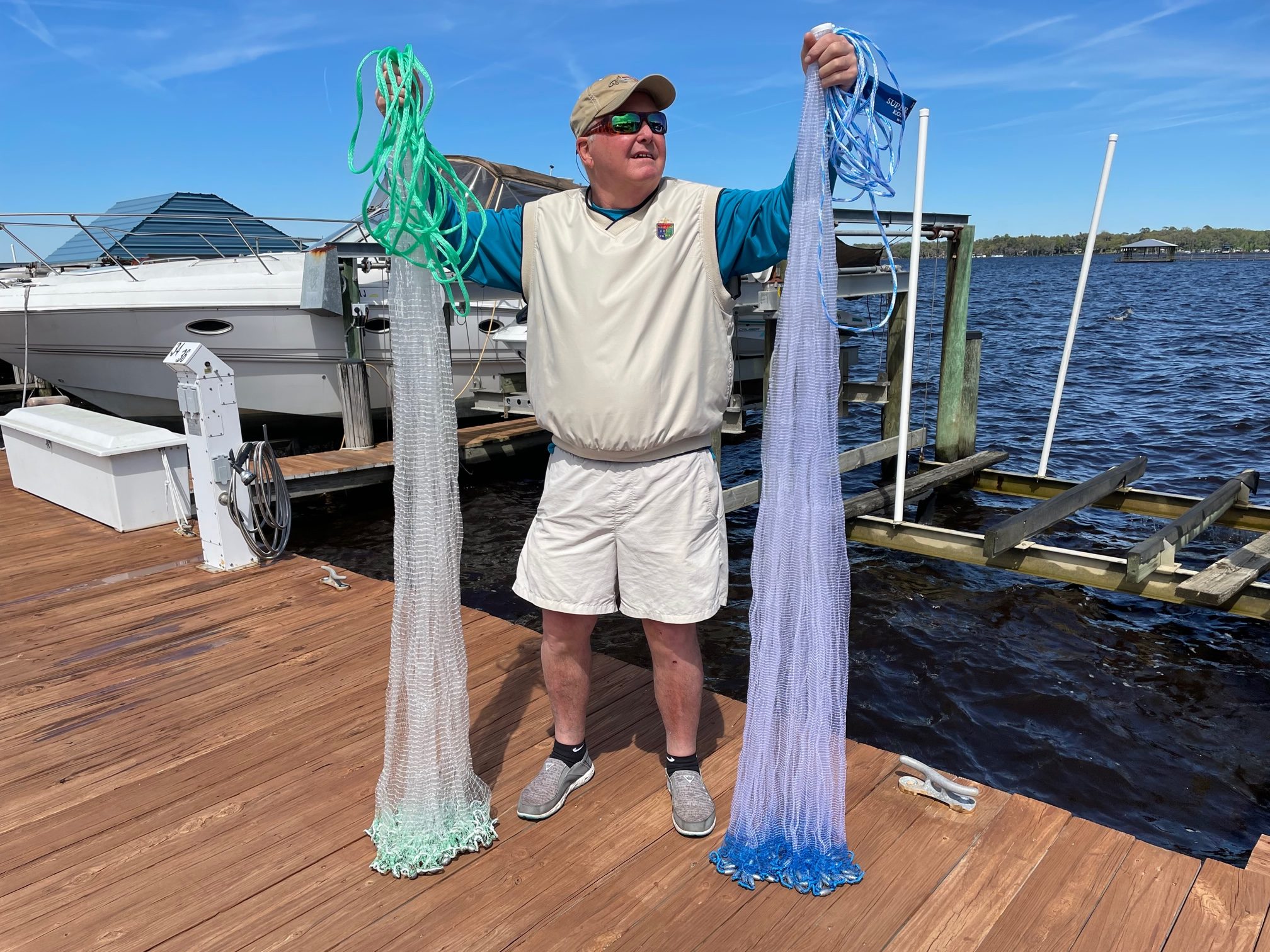 Author holds two cast nets.