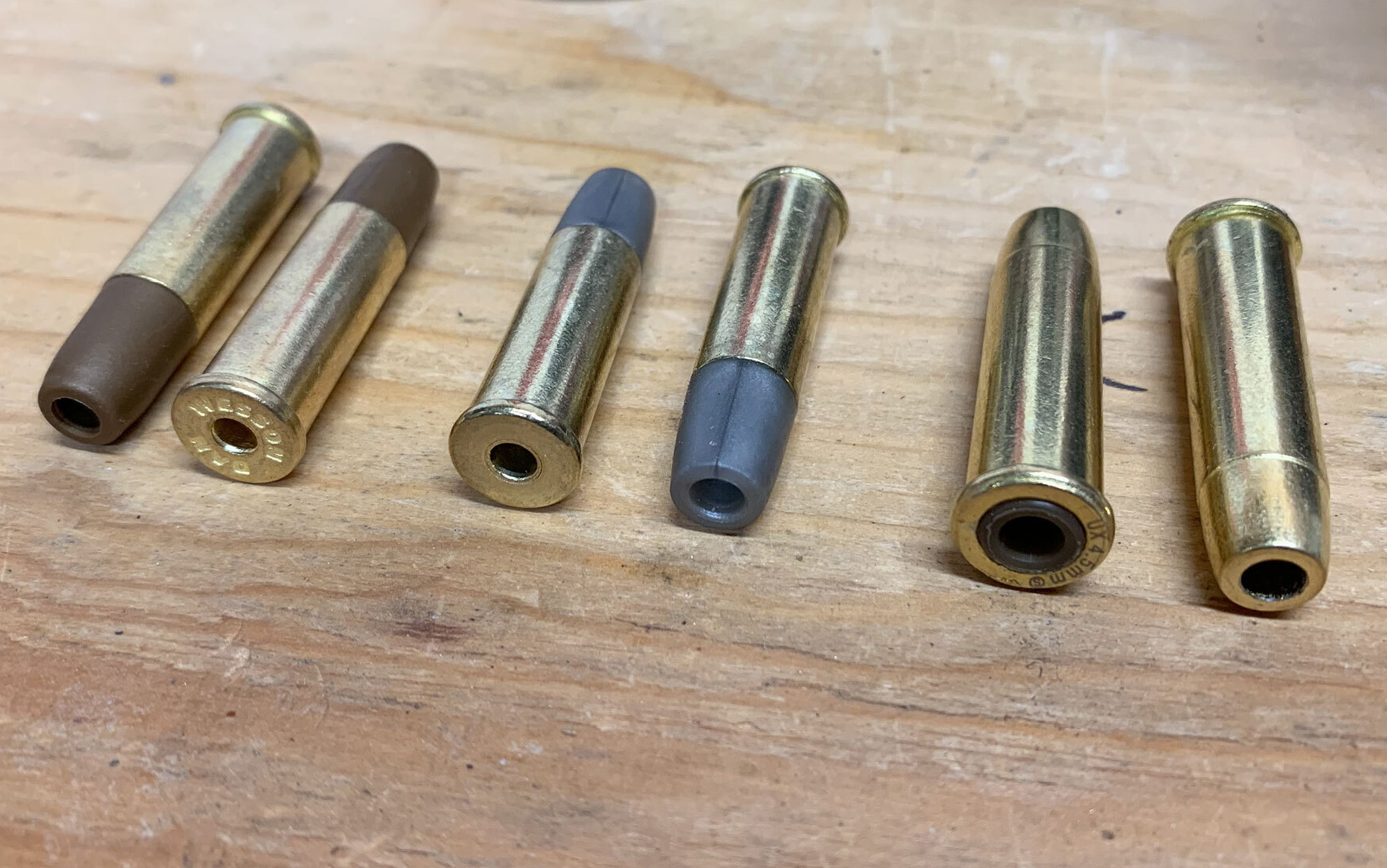 BB revolver cartridges sit on a table.