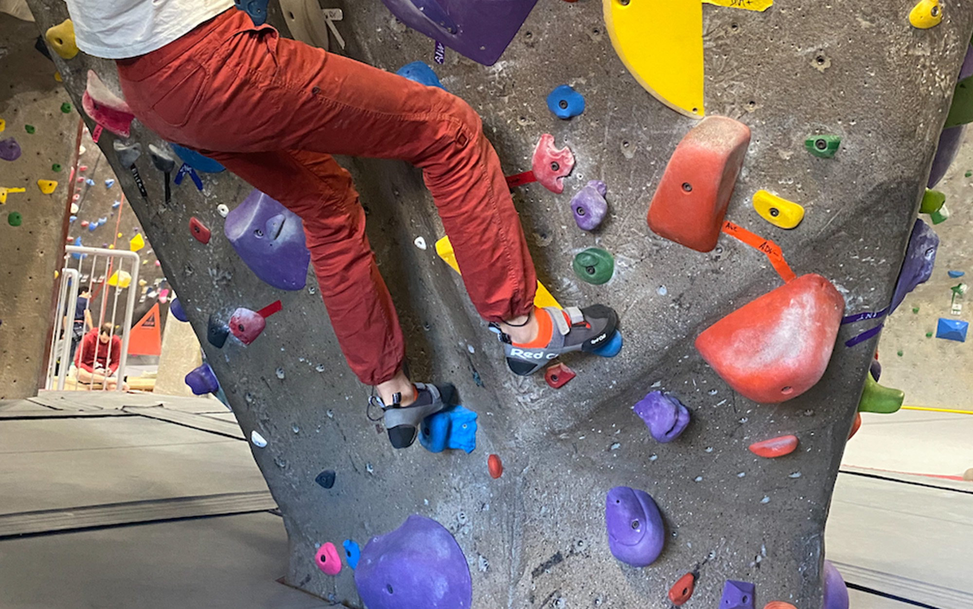 Climber wears Red Chili Voltages in the gym.