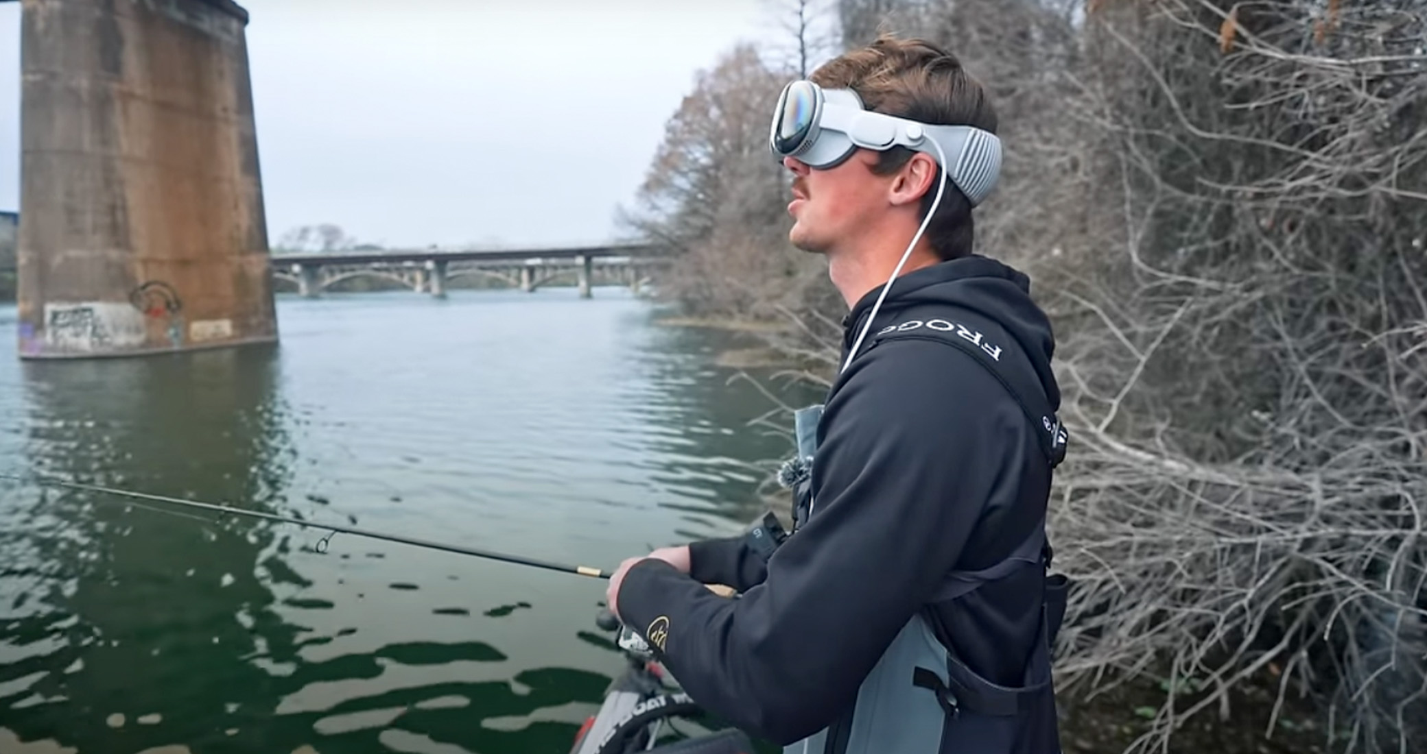 A bass angler fishes while wearing 3D goggles.