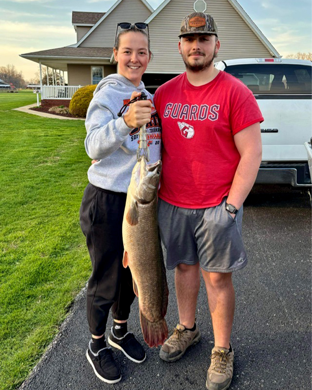 West Virginia anglers with the new state-record bowfin.