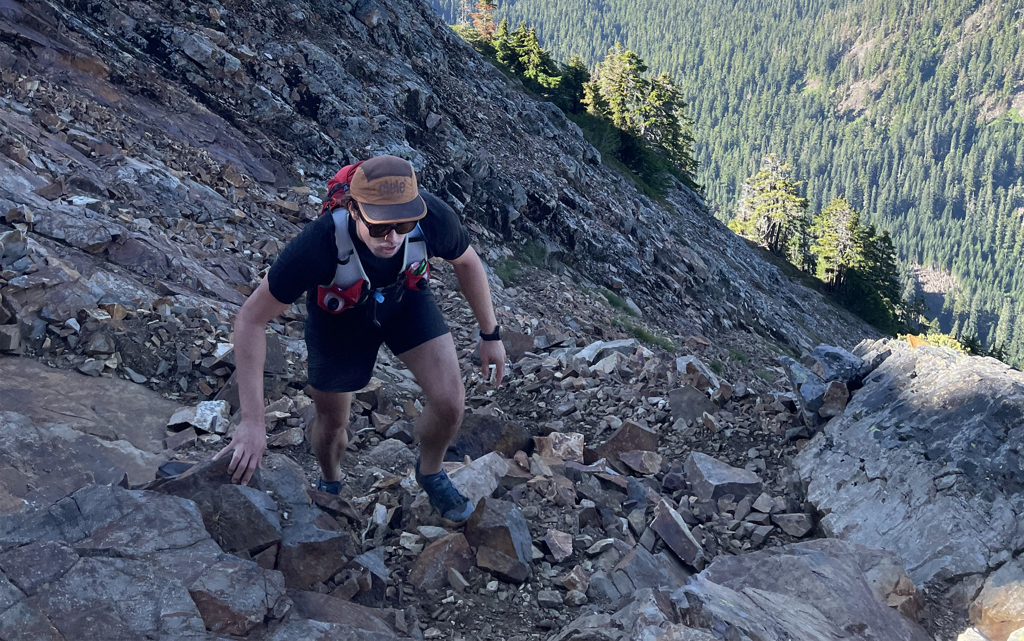 Trail runner heading up a mountain