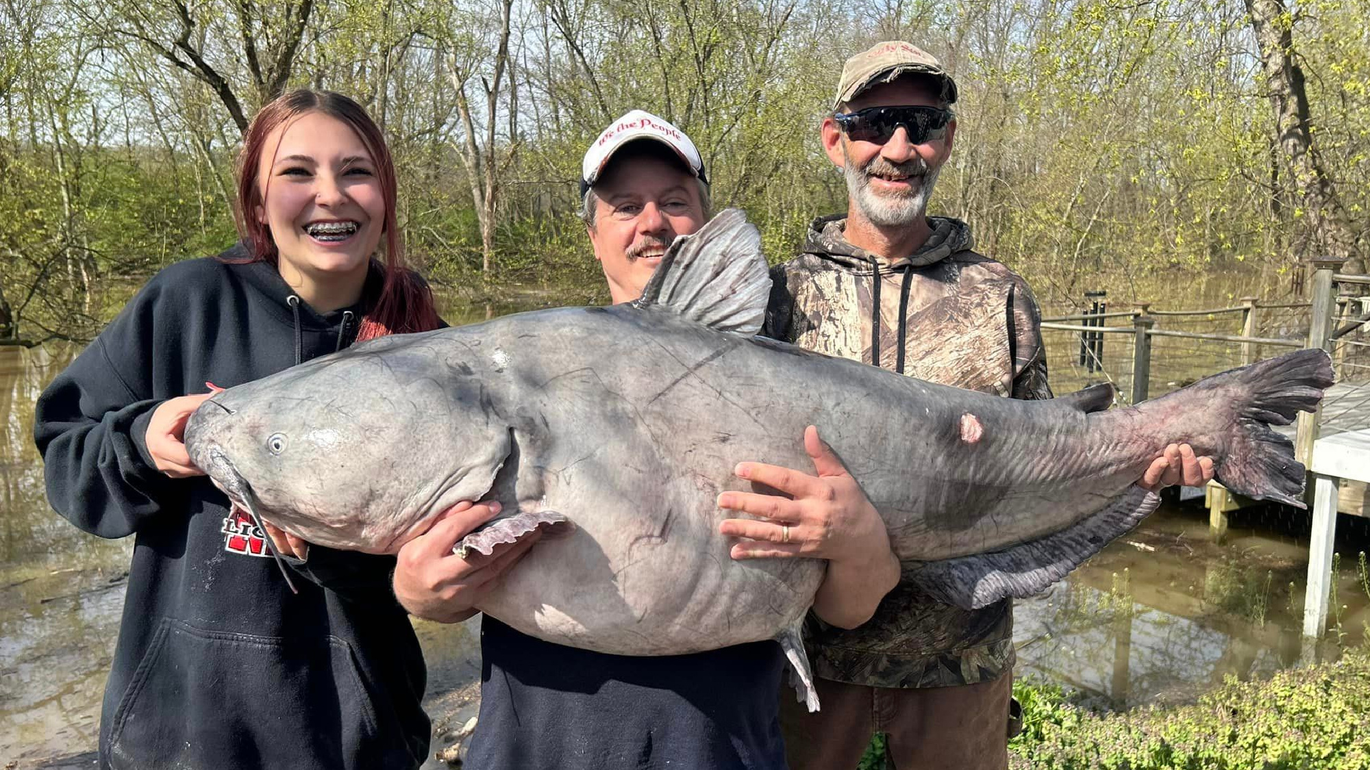 Ohio anglers hold a large blue catfish.