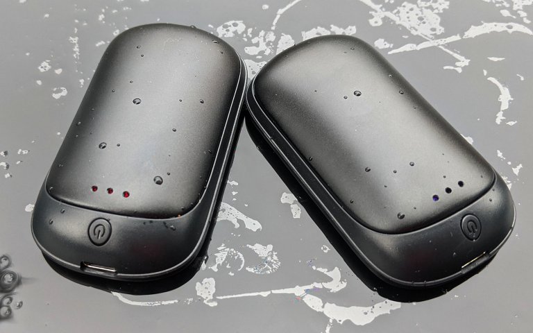 Lerat rechargeable hand warmers on damp table