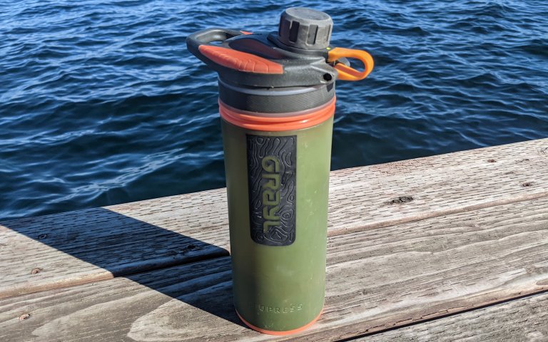 Grayl GeoPress sitting on a wooden dock