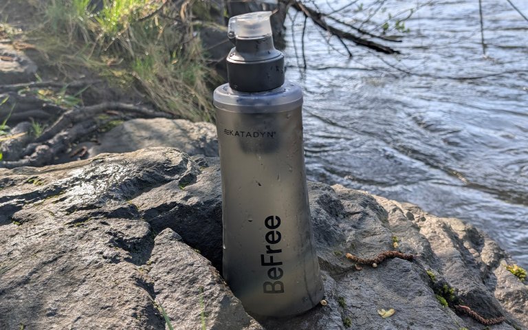 Katadyn BeFree sitting on a rock by a river