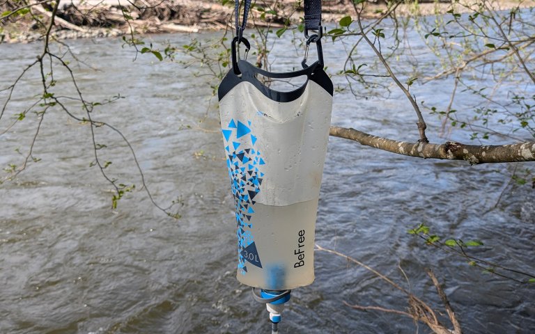 Katadyn BeFree gravity filter with a river in the background